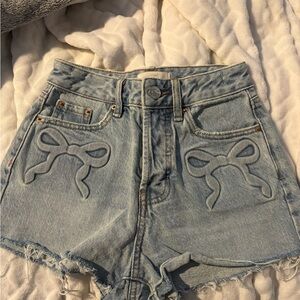 Light Blue Pacsun Denim High-Waist Shorts with Bow Appliqué. Size 0